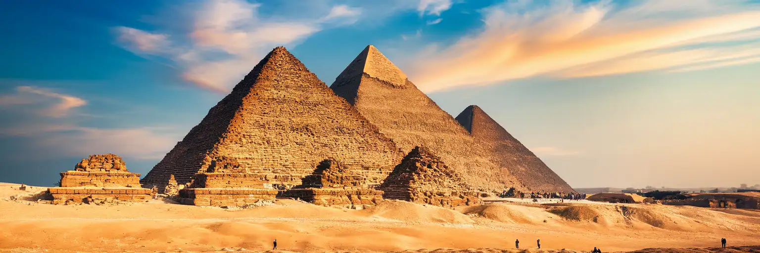 The Great Pyramid of Giza at golden hour with the Pyramid of Khafre behind on the Giza Plateau