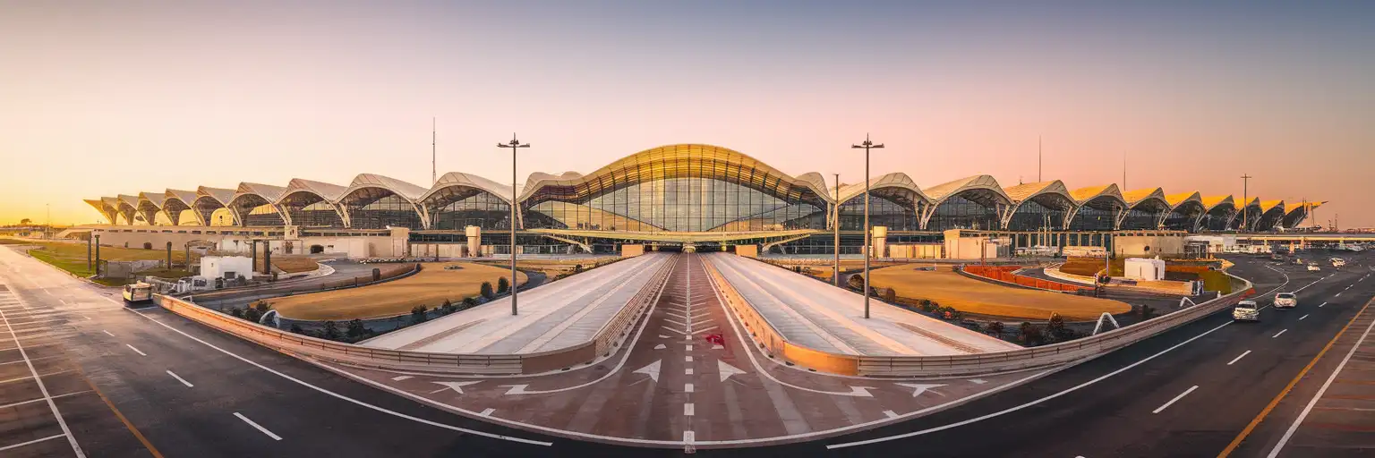 Exterior view of Seville Airport terminal in Seville, Spain at golden hour