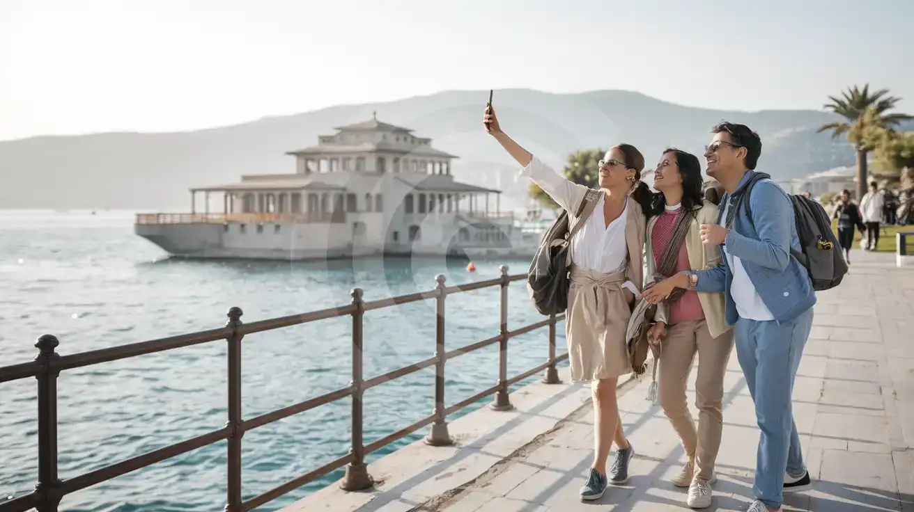 Friends taking a selfie on the Florya shoreline with Florya Atatürk Marine Mansion behind them in Istanbul